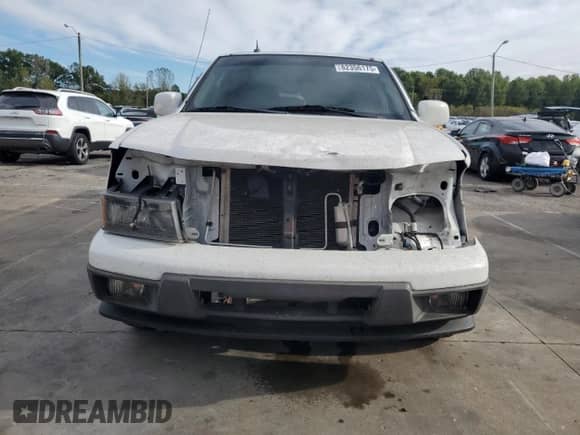 2012 Chevrolet Colorado 1LT z VIN 1GCDSCFEXC8142572, wystawiony jako Copart lot #82356175 z przebiegiem 223 436 mil mil oraz Szkoda całkowita • Salvage title. Historia ofert i sprzedaży dostępna na DreamBid. Obrazek 5.