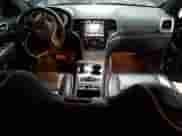 2015 Jeep Grand Cherokee Overland с VIN 1C4RJFCT1FC820933, выставлен на аукционе Copart как лот 66828805 с пробегом 72 577 миль миль и Чистый • Clean title. История ставок и продаж доступна на DreamBid. Изображение 8.