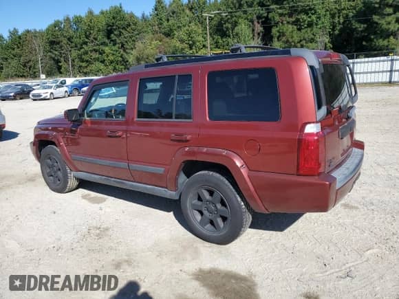 2007 Jeep Commander Overland with VIN 1J8HG68287C635671, listed as a Copart auction lot 82254715 with 167,998 mi miles and Clean title. Bid and sale history available at DreamBid. Image 2.