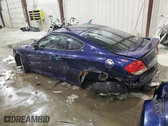 2006 Hyundai Tiburon GS с VIN KMHHM65D66U230533, выставлен на аукционе Copart как лот 87877565 с пробегом 155 039 миль миль и На запчасти • Non repairable. История ставок и продаж доступна на DreamBid. Изображение 2.