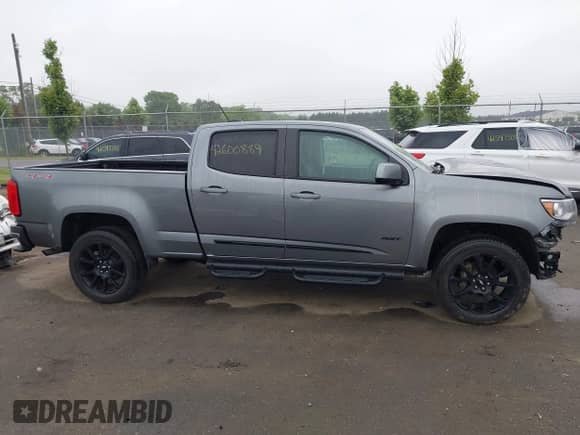 2020 Chevrolet Colorado 4WD LT with VIN 1GCGTCEN7L1235246, listed as a IAAI auction lot 42600889 with 57,012 mi miles and . Bid and sale history available at DreamBid. Image 14.