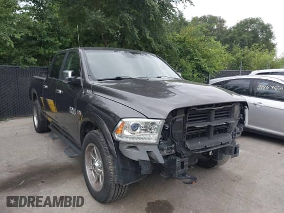 2015 Ram 1500 Laramie с VIN 1C6RR7VT0FS534421, выставлен на аукционе IAAI как лот 39895326 с пробегом 120 437 миль миль и . История ставок и продаж доступна на DreamBid. Изображение 1.