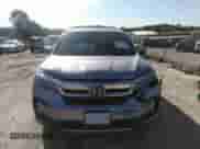 2021 Honda Pilot Touring 7-Passenger with VIN 5FNYF5H69MB000710, listed as a IAAI auction lot 43081838 with 91,899 mi miles and . Bid and sale history available at DreamBid. Image 12.