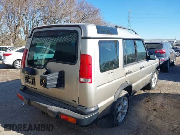 2000 Land Rover Discovery Cloth z VIN SALTY1247YA249969, wystawiony jako IAAI lot #41035905 z przebiegiem 188 643 mil mil oraz . Historia ofert i sprzedaży dostępna na DreamBid. Obrazek 4.