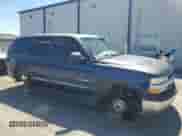 2001 Chevrolet Tahoe LS with VIN 1GNEC13T01R199886, listed as a Copart auction lot 64245125 with 242,201 mi miles and Salvage title. Bid and sale history available at DreamBid. Image 4.