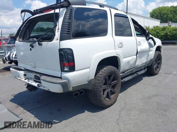 2004 Chevrolet Tahoe Z71 z VIN 1GNEK13Z84R105328, wystawiony jako IAAI lot #42850218 z przebiegiem 255 160 mil mil oraz . Historia ofert i sprzedaży dostępna na DreamBid. Obrazek 4.