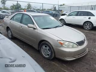 2002 Toyota Camry XLE with VIN 4T1BF30K92U526015, listed as a IAAI auction lot 43285561 with 155,559 mi miles and . Bid and sale history available at DreamBid. Image 1.