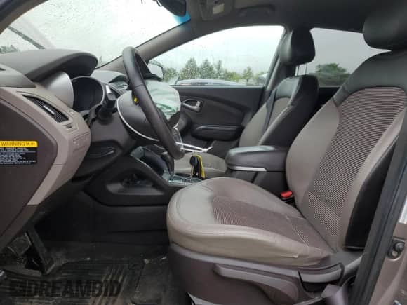 2013 Hyundai Tucson GLS z VIN KM8JU3ACXDU548018, wystawiony jako Copart lot #57684275 z przebiegiem 127 062 mil mil oraz Szkoda całkowita • Salvage title. Historia ofert i sprzedaży dostępna na DreamBid. Obrazek 7.