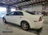 2012 Chevrolet Malibu LTZ 1LZ with VIN 1G1ZE5E09CF168390, listed as a Copart auction lot 84930215 with 154,381 mi miles and Salvage title. Bid and sale history available at DreamBid. Image 2.