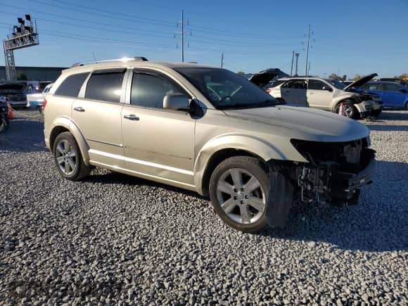 2010 Dodge Journey R/T с VIN 3D4PH6FV2AT122265, выставлен на аукционе Copart как лот 77023154 с пробегом 149 826 миль миль и Списание • Salvage title. История ставок и продаж доступна на DreamBid. Изображение 4.