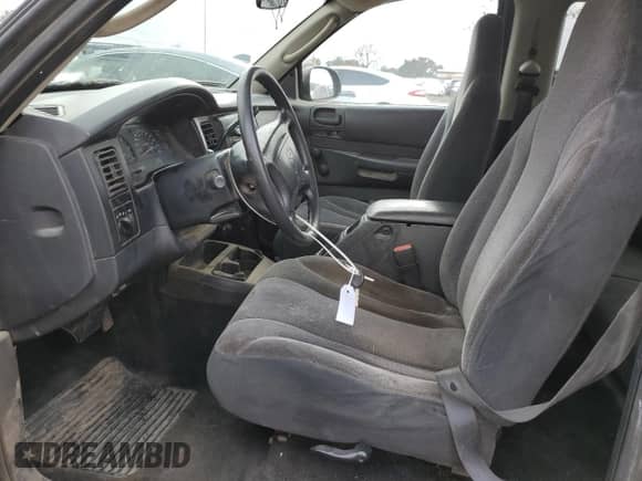 2002 Dodge Dakota с VIN 1B7GL12XX2S718443, выставлен на аукционе Copart как лот 84568934 с пробегом 122 127 миль миль и Чистый • Clean title. История ставок и продаж доступна на DreamBid. Изображение 7.