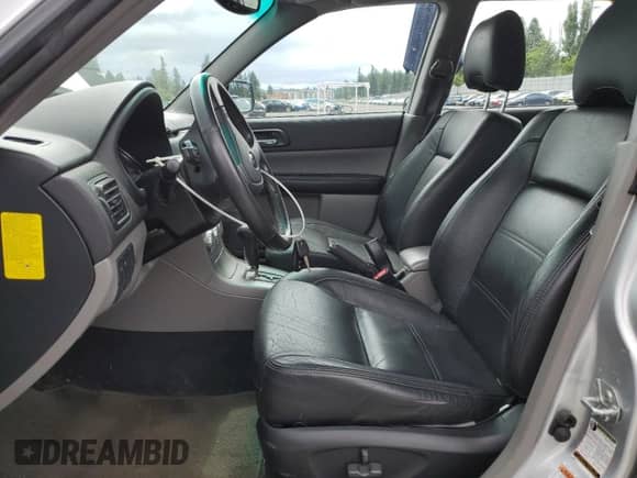 2005 Subaru Forester XT with VIN JF1SG69675H716858, listed as a Copart auction lot 62895165 with 86,863 mi miles and Salvage title. Bid and sale history available at DreamBid. Image 7.