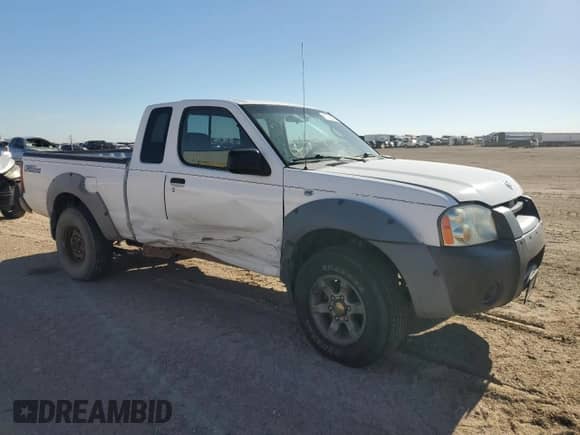 2002 Nissan Frontier XE z VIN 1N6ED26T52C366879, wystawiony jako Copart lot #67726024 z przebiegiem 141 068 mil mil oraz Szkoda całkowita • Salvage title. Historia ofert i sprzedaży dostępna na DreamBid. Obrazek 4.