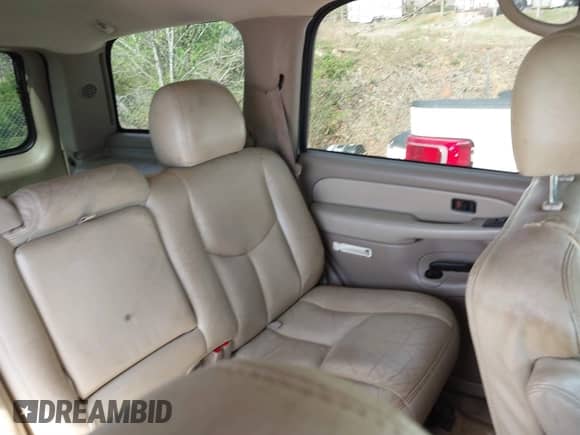 2003 Chevrolet Tahoe LS z VIN 1GNEC13Z63R140932, wystawiony jako IAAI lot #41703060 z przebiegiem 345 133 mil mil oraz . Historia ofert i sprzedaży dostępna na DreamBid. Obrazek 8.