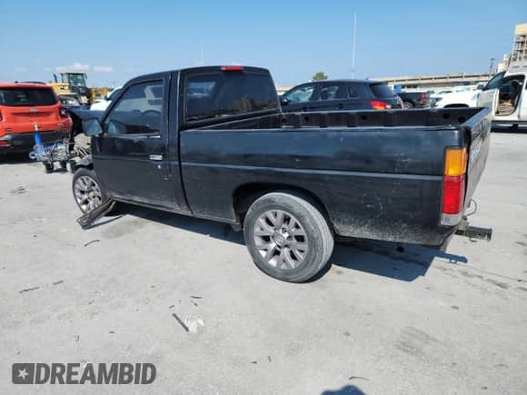 1996 Nissan Frontier XE with VIN 1N6SD11S7TC365939, listed as a Copart auction lot 70723465 with 88,414 mi miles and Salvage title. Bid and sale history available at DreamBid. Image 2.
