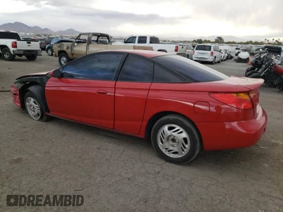 2001 Saturn SC with VIN 1G8ZY12701Z201761, listed as a Copart auction lot 76792804 with 85,352 mi miles and Salvage title. Bid and sale history available at DreamBid. Image 2.