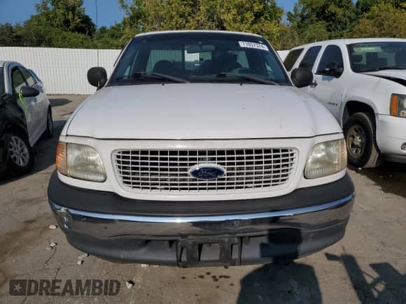 2001 Ford F-150 XL with VIN 1FTRF17W61NB20606, listed as a Copart auction lot 71057374 with Not provided miles and Salvage title. Bid and sale history available at DreamBid. Image 5.