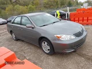 2003 Toyota Camry LE with VIN 4T1BF32K13U553319, listed as a IAAI auction lot 43284776 with 157,210 mi miles and . Bid and sale history available at DreamBid. Image 1.