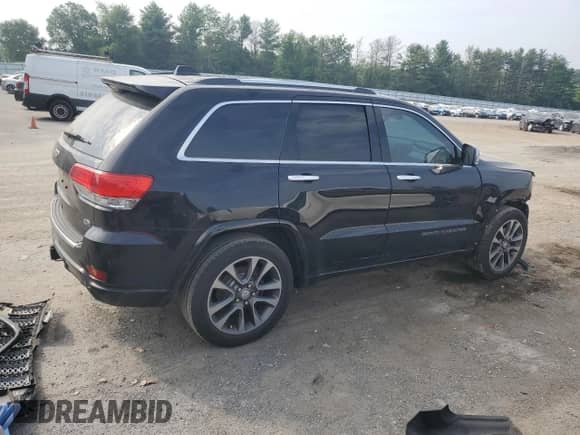 2017 Jeep Grand Cherokee Overland with VIN 1C4RJFCG4HC624457, listed as a Copart auction lot 60759955 with 130,595 mi miles and Salvage title. Bid and sale history available at DreamBid. Image 3.