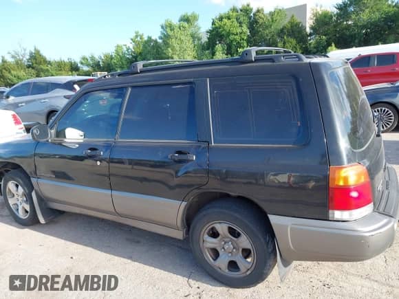1999 Subaru Forester S with VIN JF1SF6552XH736647, listed as a IAAI auction lot 42565079 with 215,244 mi miles and . Bid and sale history available at DreamBid. Image 14.