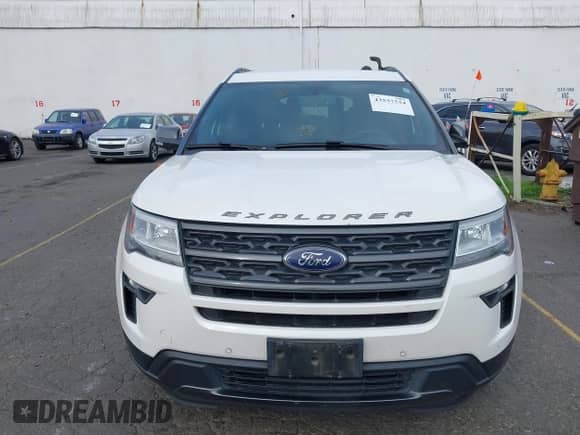 2018 Ford Explorer XLT z VIN 1FM5K8DH9JGC06811, wystawiony jako IAAI lot #43537534 z przebiegiem 135 099 mil mil oraz . Historia ofert i sprzedaży dostępna na DreamBid. Obrazek 6.