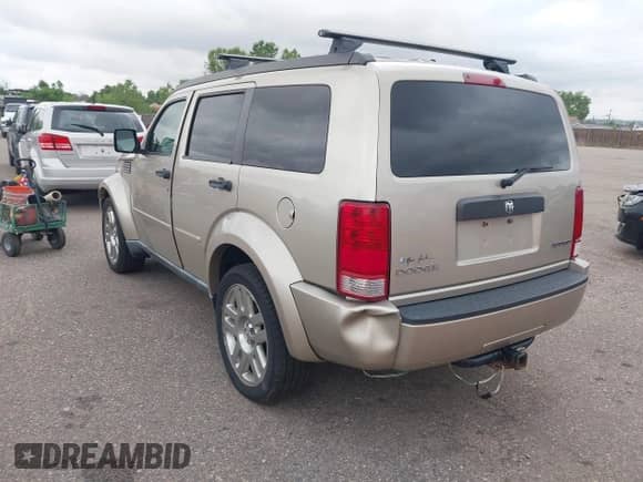 2010 Dodge Nitro Heat with VIN 1D4PT4GK7AW156722, listed as a IAAI auction lot 42508953 with 283,690 mi miles and . Bid and sale history available at DreamBid. Image 3.