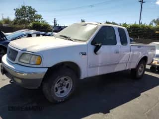 1999 Ford F-150 XL with VIN 1FTRX18L5XKA14157, listed as a Copart auction lot 72102355 with Not provided miles and Clean title. Bid and sale history available at DreamBid. Image 1.