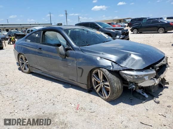 2017 BMW 4 Series 440i with VIN WBA4P1C34HK522698, listed as a Copart auction lot 61084955 with Not provided miles and Salvage title. Bid and sale history available at DreamBid. Image 4.