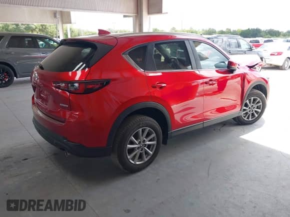 2023 Mazda CX-5 S Preferred z VIN JM3KFBCMXP0290055, wystawiony jako IAAI lot #43125811 z przebiegiem 11 364 mil mil oraz . Historia ofert i sprzedaży dostępna na DreamBid. Obrazek 4.