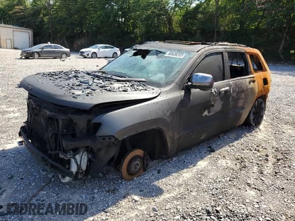 2015 Jeep Grand Cherokee Overland с VIN 1C4RJFCT0FC949021, выставлен на аукционе Copart как лот 60638205 с пробегом Не указан миль и Списание • Salvage title. История ставок и продаж доступна на DreamBid. Изображение 1.