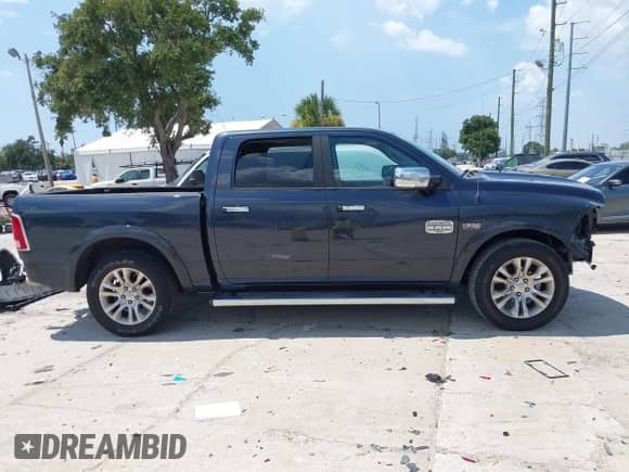 2016 Ram 1500 Longhorn Limited with VIN 1C6RR6PTXGS183199, listed as a IAAI auction lot 42859231 with 137,295 mi miles and . Bid and sale history available at DreamBid. Image 14.
