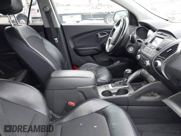 2015 Hyundai Tucson Limited z VIN KM8JUCAG5FU983308, wystawiony jako IAAI lot #41748548 z przebiegiem Nie podano mil oraz . Historia ofert i sprzedaży dostępna na DreamBid. Obrazek 5.