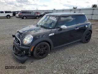 2012 MINI Hardtop S with VIN WMWSV3C51CTY17111, listed as a Copart auction lot 80073055 with 147,649 mi miles and Salvage title. Bid and sale history available at DreamBid. Image 1.