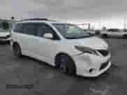 2015 Toyota Sienna SE with VIN 5TDXK3DC4FS663754, listed as a Copart auction lot 65745835 with 100,446 mi miles and Salvage title. Bid and sale history available at DreamBid. Image 4.