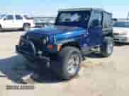 2004 Jeep Wrangler Sport z VIN 1J4FA49S04P753389, wystawiony jako IAAI lot #43408484 z przebiegiem 157 237 mil mil oraz . Historia ofert i sprzedaży dostępna na DreamBid. Obrazek 2.