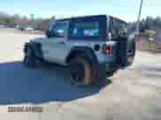 2023 Jeep Wrangler Sport with VIN 1C4GJXAN8PW640978, listed as a IAAI auction lot 41843414 with 16,440 mi miles and . Bid and sale history available at DreamBid. Image 3.