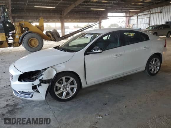 2014 Volvo S60 T5 с VIN YV1612FS5E2297803, выставлен на аукционе Copart как лот 71890265 с пробегом 66 294 миль миль и Списание • Salvage title. История ставок и продаж доступна на DreamBid. Изображение 1.