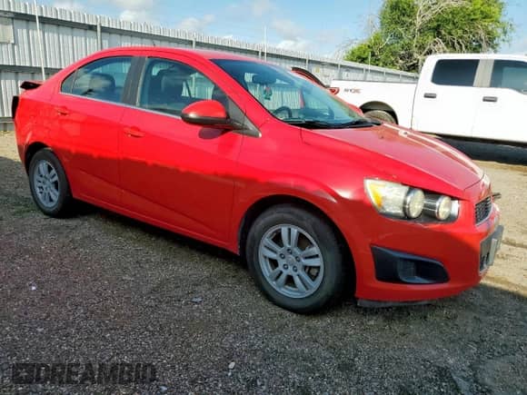 2014 Chevrolet Sonic LT with VIN 1G1JC5SB1E4194277, listed as a Copart auction lot 61559895 with 60,847 mi miles and Salvage title. Bid and sale history available at DreamBid. Image 4.