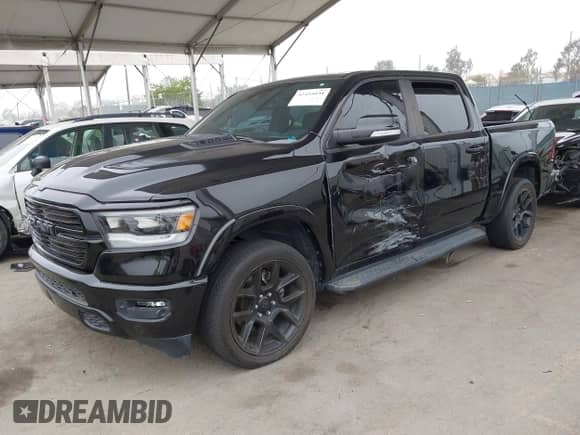 2021 Ram 1500 Laramie z VIN 1C6SRFJT9MN542322, wystawiony jako IAAI lot #42455038 z przebiegiem 68 601 mil mil oraz . Historia ofert i sprzedaży dostępna na DreamBid. Obrazek 17.