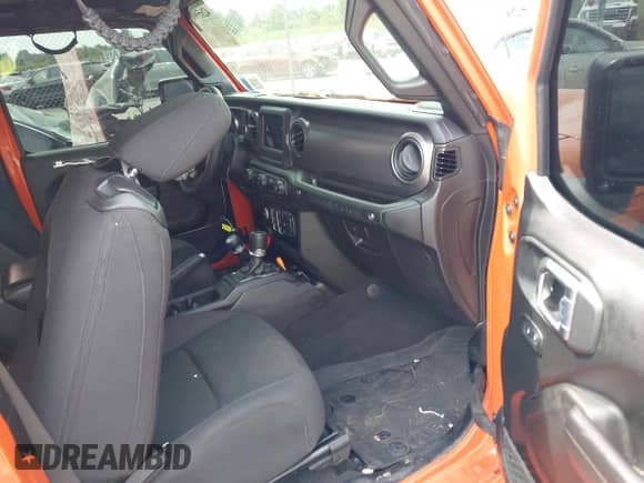 2023 Jeep Wrangler Sport with VIN 1C4HJXAG1PW692362, listed as a IAAI auction lot 42659087 with 52,179 mi miles and . Bid and sale history available at DreamBid. Image 5.