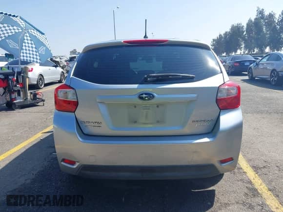 2012 Subaru Impreza Premium z VIN JF1GPAD64CH215617, wystawiony jako IAAI lot #43345861 z przebiegiem 157 056 mil mil oraz . Historia ofert i sprzedaży dostępna na DreamBid. Obrazek 17.