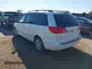 2009 Toyota Sienna XLE with VIN 5TDZK22C59S276897, listed as a IAAI auction lot 43165842 with 214,043 mi miles and . Bid and sale history available at DreamBid. Image 3.