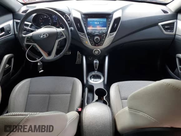 2013 Hyundai Veloster w/Black Int z VIN KMHTC6AD5DU088630, wystawiony jako Copart lot #80093115 z przebiegiem 76 327 mil mil oraz Szkoda całkowita • Salvage title. Historia ofert i sprzedaży dostępna na DreamBid. Obrazek 8.