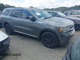 2011 Dodge Durango Crew with VIN 1D4RD4GG3BC740328, listed as a IAAI auction lot 43129169 with 167,553 mi miles and . Bid and sale history available at DreamBid. Image 1.