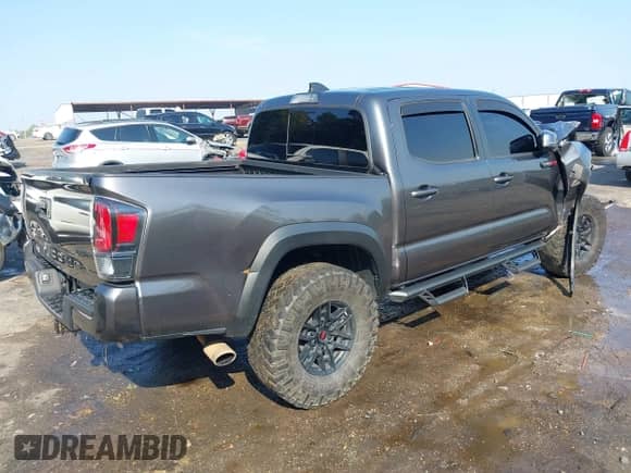 2020 Toyota Tacoma SR5 with VIN 5TFCZ5AN4LX237581, listed as a IAAI auction lot 43191708 with 126,946 mi miles and . Bid and sale history available at DreamBid. Image 4.