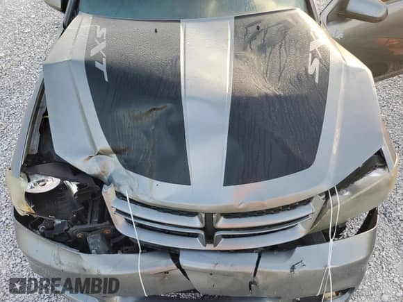 2013 Dodge Avenger SXT z VIN 1C3CDZCB0DN502507, wystawiony jako Copart lot #84815875 z przebiegiem Nie podano mil oraz Szkoda całkowita • Salvage title. Historia ofert i sprzedaży dostępna na DreamBid. Obrazek 11.