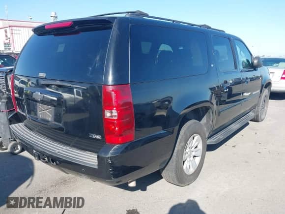 2007 Chevrolet Suburban z VIN 1GNFC16YX7R257071, wystawiony jako IAAI lot #41867224 z przebiegiem 203 385 mil mil oraz . Historia ofert i sprzedaży dostępna na DreamBid. Obrazek 4.