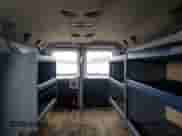 2010 Ford Econoline Cargo Commercial с VIN 1FTNE2EW8ADA19194, выставлен на аукционе Copart как лот 80116165 с пробегом 189 803 миль миль и Чистый • Clean title. История ставок и продаж доступна на DreamBid. Изображение 10.
