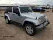 2007 Jeep Wrangler Unlimited Sahara z VIN 1J4GA59167L212909, wystawiony jako Copart lot #82455775 z przebiegiem 124 148 mil mil oraz Czysty tytuł • Clean title. Historia ofert i sprzedaży dostępna na DreamBid. Obrazek 4.