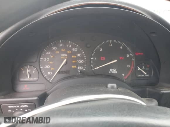 1999 Saturn SL with VIN 1G8ZH5288XZ139499, listed as a Copart auction lot 71115484 with 254,290 mi miles and Salvage title. Bid and sale history available at DreamBid. Image 9.